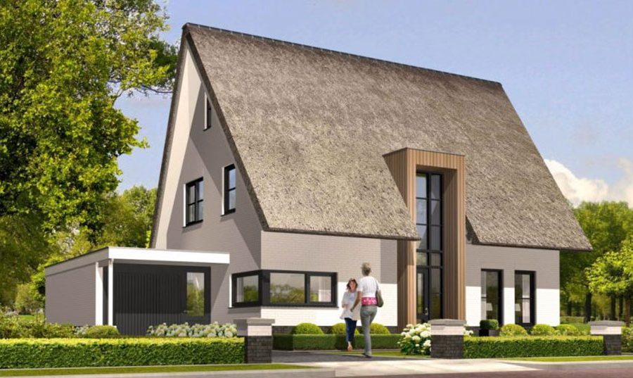 Bouwbedrijf Poppink wit geschilderd huis met een rieten dak Hooge Boekel